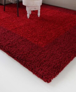 Alfombra de pelo largo con ribete Shaggy Trend - Roja - close up hoek